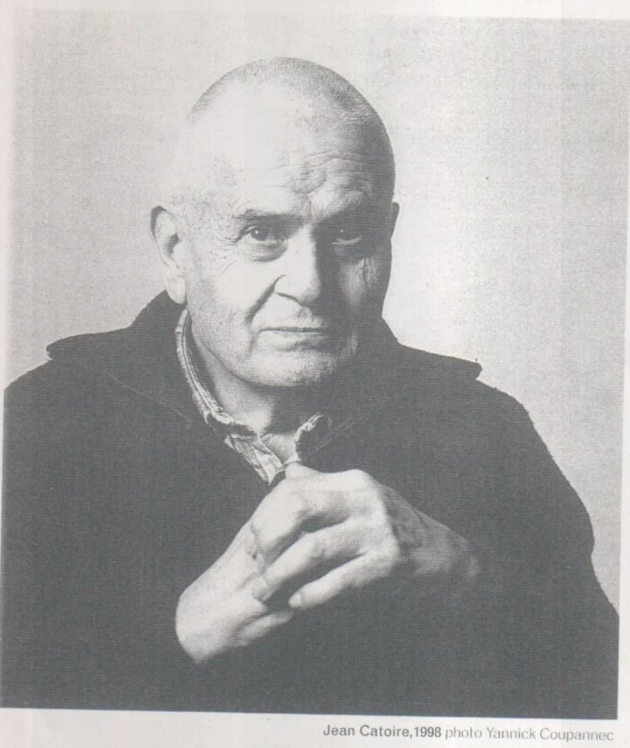 Black-and-white portrait of Jean Catoire, hands clasped